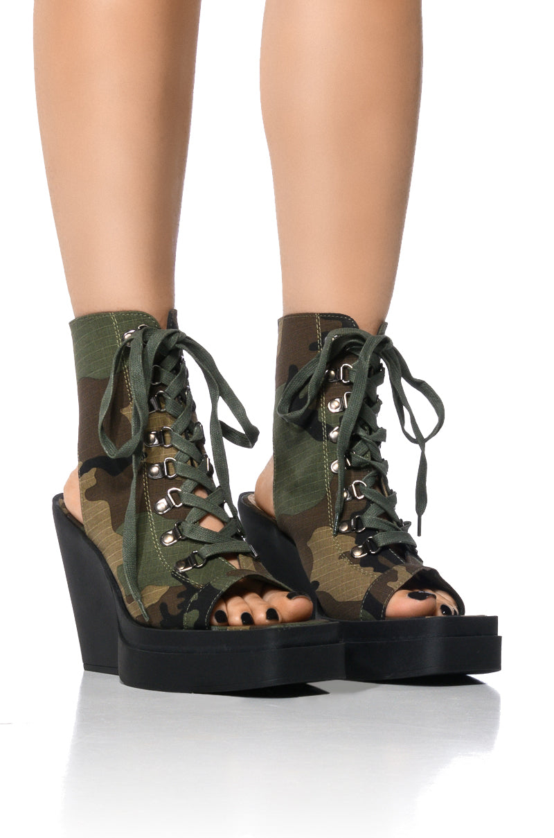 OFF DUTY PEEP TOE BOOTIE IN CAMO